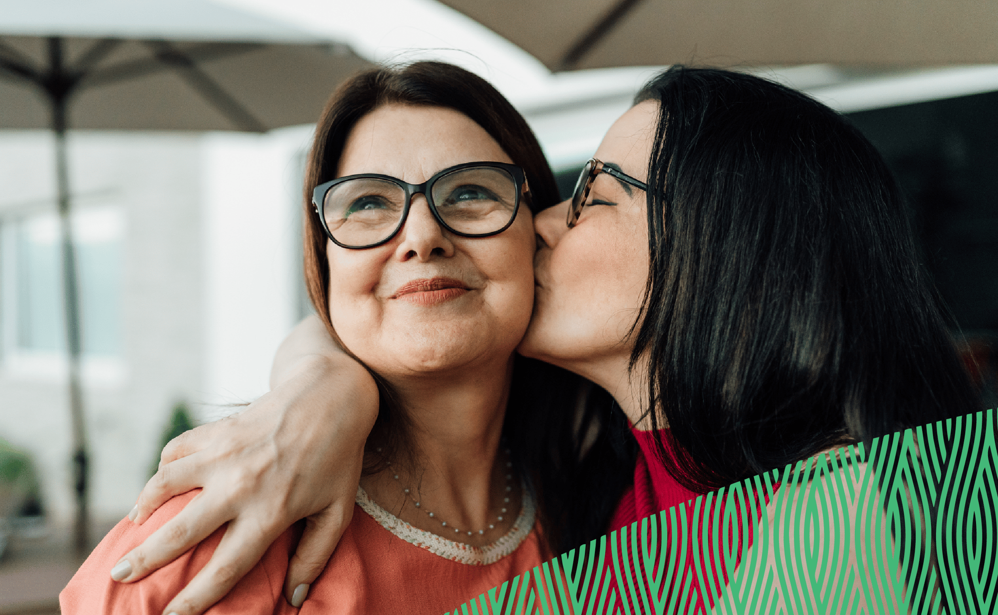 Woman Kissing Friend After they Found an Affordable Home